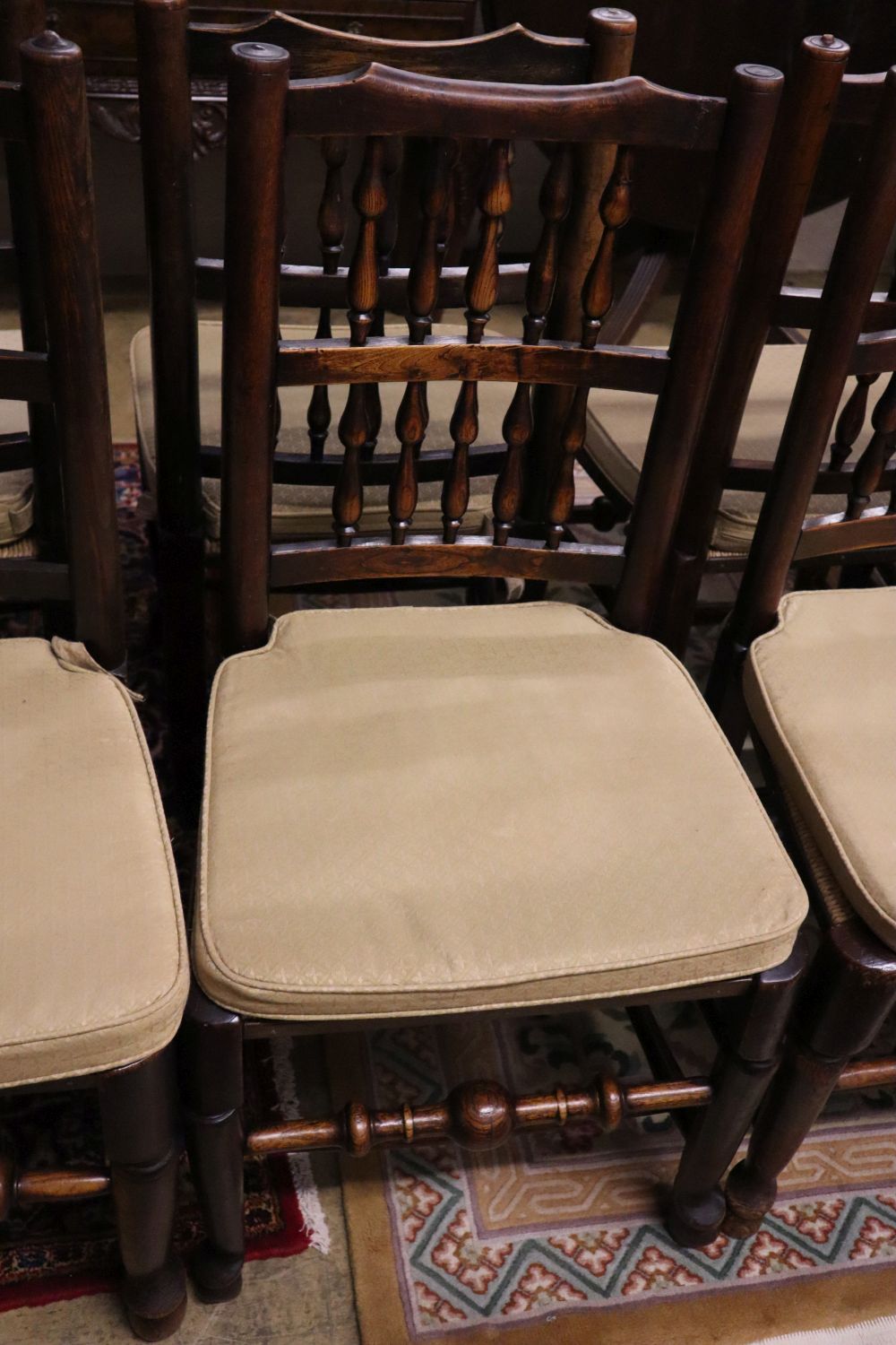 A set of eight 19th century ash rush-seat chairs